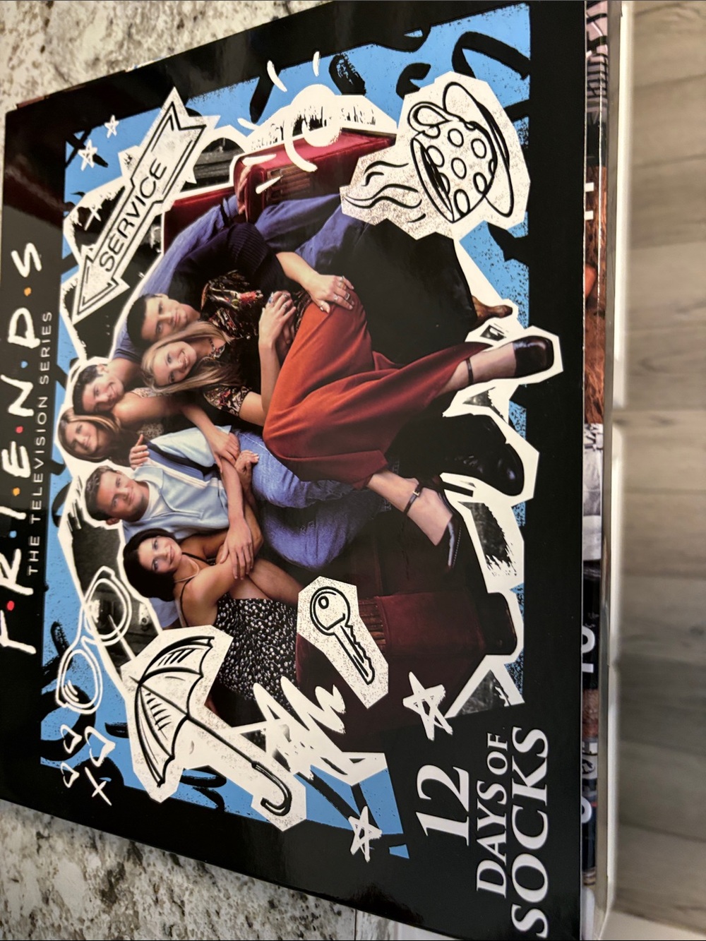 FRIENDS Multi-Color Cast Graphic Box Art includes 12 prs of socks